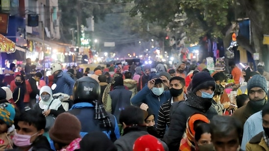 People flout Covid-appropriate behaviour as they visit the weekly market in Jungpura, New Delhi.&nbsp;