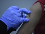 A health worker administers a dose of Covid-19 vaccine at the Civil Hospital in Gurugram. (Parveen Kumar/HT) A health worker administers a dose of Covid-19 vaccine at the Civil Hospital in Gurugram. (Parveen Kumar/HT)