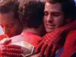 Tobey Maguire, Tom Holland and Andrew Garfield in a scene from Spider-Man: No Way Home. Tobey Maguire, Tom Holland and Andrew Garfield in a scene from Spider-Man: No Way Home.