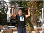'Being fit is easy,' says Milind as he performs a pullup variation(Instagram/@milindrunning)