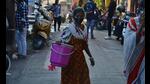 A resident of Ghodbunder Road in Thane does her best to save water in view of the water woes that the residents face. (PRAFUL GANGURDE/HT PHOTO) A resident of Ghodbunder Road in Thane does her best to save water in view of the water woes that the residents face. (PRAFUL GANGURDE/HT PHOTO)