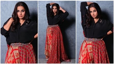 Every Indian girl has her eyes locked on Vidya Balan's ethnic collection. From sarees to contemporary Indian wears, Vidya Balan is the queen of ethnic fashion. Recently, she took to her Instagram handle to share photos of herself in a black collared blouse and red printed skirt. (Instagram/@vidyabalan) Every Indian girl has her eyes locked on Vidya Balan's ethnic collection. From sarees to contemporary Indian wears, Vidya Balan is the queen of ethnic fashion. Recently, she took to her Instagram handle to share photos of herself in a black collared blouse and red printed skirt. (Instagram/@vidyabalan)