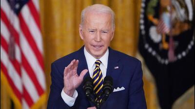 US President Joe Biden speaks during a press conference on the eve of his first year in office, from the East Room of the White House in Washington, DC. (AFP) US President Joe Biden speaks during a press conference on the eve of his first year in office, from the East Room of the White House in Washington, DC. (AFP)