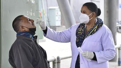 A health worker collecting swab samples for Covid testing near Sarabha Nagar Market in Ludhiana on Thursday. (Harsimar Pal Singh/HT) A health worker collecting swab samples for Covid testing near Sarabha Nagar Market in Ludhiana on Thursday. (Harsimar Pal Singh/HT)