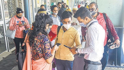 Mumbai: A healthworker checks vaccination certificates of arriving passengers amid concern over spread of 'Omicron' variant, at Bandra Terminus in Mumbai, Thursday, Jan. 20, 2022. (PTI Photo)(PTI01_20_2022_000120B) (PTI) Mumbai: A healthworker checks vaccination certificates of arriving passengers amid concern over spread of 'Omicron' variant, at Bandra Terminus in Mumbai, Thursday, Jan. 20, 2022. (PTI Photo)(PTI01_20_2022_000120B) (PTI)