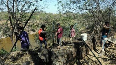 The forest department has begun erecting a fence around the quarry on Vetal tekdi in Pune. (HT PHOTO) The forest department has begun erecting a fence around the quarry on Vetal tekdi in Pune. (HT PHOTO)