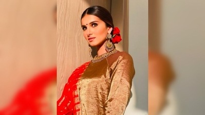 In one of the promotional events of her film Tadap, Tara Sutaria wore a beautiful golden salwar suit which she teamed with a bright red dupatta. (Instagram/@tarasutaria) In one of the promotional events of her film Tadap, Tara Sutaria wore a beautiful golden salwar suit which she teamed with a bright red dupatta. (Instagram/@tarasutaria)