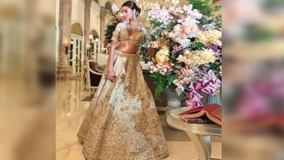 With her hair parted in the middle and tied in a neat ponytail, Tara Sutaria posed in a royal backdrop. (Instagram/@anitadongre) With her hair parted in the middle and tied in a neat ponytail, Tara Sutaria posed in a royal backdrop. (Instagram/@anitadongre)