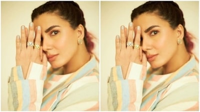 Kirti played muse to fashion designer house Doh Tak Keh and picked a kesar pista cotton co-ord set. The set came with a long kurta and a pair of trousers. Kirti teamed it with a handwoven blazer and completed her look. (Instagram/@iamkirtikulhari)