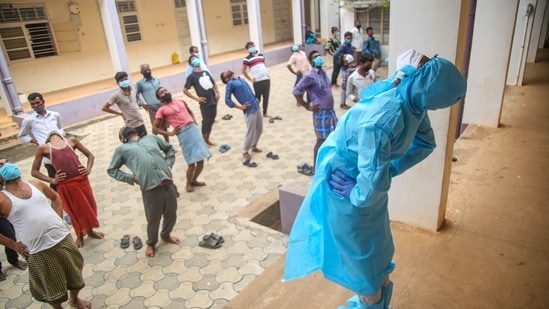 Covid-19 patients participate in a yoga session at a Covid care centre in Kanyakumari. (PTI) Covid-19 patients participate in a yoga session at a Covid care centre in Kanyakumari. (PTI)