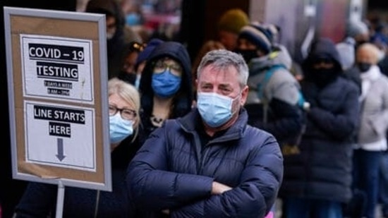People wait in line at a COVID-19 testing site in New York' Times Square (AP/Image used only for representation) People wait in line at a COVID-19 testing site in New York' Times Square (AP/Image used only for representation)