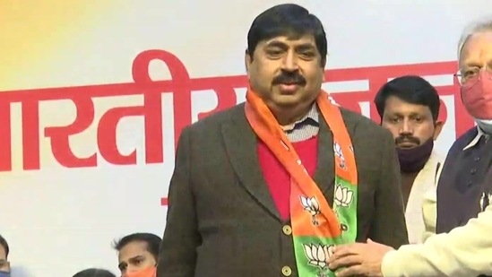 Samajwadi Party leader Pramod Gupta joining the BJP on Thursday.(ANI Photo)