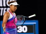 Naomi Osaka of Japan bounces her racket in frustration during her third Rond match against Amanda Anisimova of the U.S. at the Australian Open Naomi Osaka of Japan bounces her racket in frustration during her third Rond match against Amanda Anisimova of the U.S. at the Australian Open 