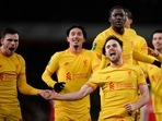 Liverpool's Diogo Jota celebrates with teammates after scoring his side's second goal during the English League Cup semifinal second leg soccer match between Arsenal and Liverpool at the Emirates Stadium in London. Liverpool's Diogo Jota celebrates with teammates after scoring his side's second goal during the English League Cup semifinal second leg soccer match between Arsenal and Liverpool at the Emirates Stadium in London.