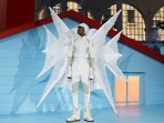 A model presents a creation by late designer Virgil Abloh as part of his Fall/Winter 2022 collection show for fashion house Louis Vuitton during Men's Fashion Week in Paris