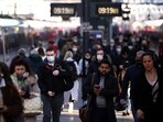 People walk along a platform at King's Cross train station amid the ongoing coronavirus disease (Covid-19) outbreak in London, Britain. (REUTERS)