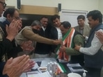 Harak Singh Rawat being inducted by Harsh Rawat. Harak Singh Rawat being inducted by Harsh Rawat.
