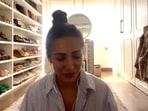 Malaika Arora sitting in her walk-in closet. Malaika Arora sitting in her walk-in closet. 