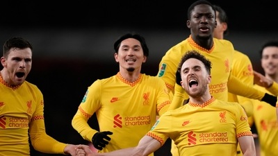 Liverpool's Diogo Jota celebrates with teammates after scoring his side's second goal during the English League Cup semifinal second leg soccer match between Arsenal and Liverpool at the Emirates Stadium in London. (AP) Liverpool's Diogo Jota celebrates with teammates after scoring his side's second goal during the English League Cup semifinal second leg soccer match between Arsenal and Liverpool at the Emirates Stadium in London. (AP)