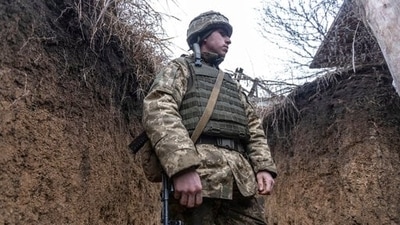 Ukrainian soldier stands in the trench on the line of separation from pro-Russian rebels, Mariupol, Donetsk region, Ukraine. (AP)