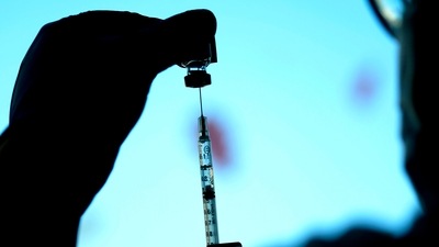 A dose of a Pfizer Covid-19 vaccine is prepared at Lurie Children's Hospital in Chicago. (Representational Image / AP) A dose of a Pfizer Covid-19 vaccine is prepared at Lurie Children's Hospital in Chicago. (Representational Image / AP)