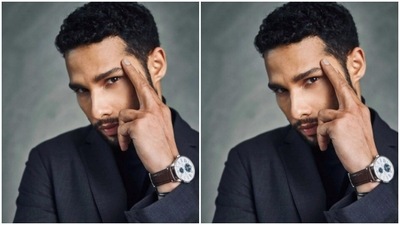 Siddhant paired his pantsuit with a turtleback black tee shirt and accessorised it with a watch from the shelves of Ulysse Nardin. (Instagram/@siddhantchaturvedi)