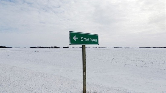 A sign post for the small border town of Emerson near the Canada-US border crossing in Emerson, Manitoba.(Reuters)