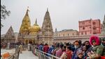 Varanasi: Crowd of devotees at Kashi Vishwanath temple on the first day of the New Year 2022, in Varanasi, Saturday, Jan. 2022. (PTI Photo) (PTI01_01_2022_000093B) (PTI) Varanasi: Crowd of devotees at Kashi Vishwanath temple on the first day of the New Year 2022, in Varanasi, Saturday, Jan. 2022. (PTI Photo) (PTI01_01_2022_000093B) (PTI)