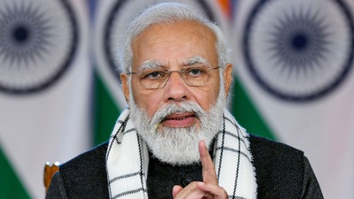 Prime Minister Narendra Modi interacts with the DMs of various districts on the implementation of key government schemes, through video conferencing, in New Delhi, Saturday, January 22, 2022. (PTI) Prime Minister Narendra Modi interacts with the DMs of various districts on the implementation of key government schemes, through video conferencing, in New Delhi, Saturday, January 22, 2022. (PTI)