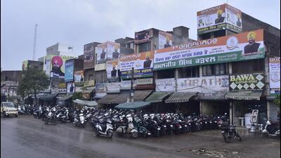 Political parties’ posters and hoardings installed on different buildings in Atam Nagar in Ludhiana on Saturday. (Gurpreet Singh/HT) Political parties’ posters and hoardings installed on different buildings in Atam Nagar in Ludhiana on Saturday. (Gurpreet Singh/HT)