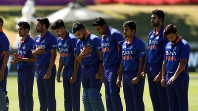India players line up during the national anthems before the match. (REUTERS)