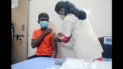 A beneficiary from 15-18 age group gets vaccinated at Rajiv Gandhi hospital, Yerawada in Pune on Saturday. (Shankar Narayan/HT PHOTO)