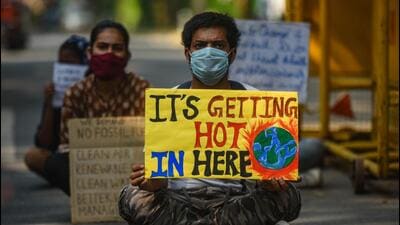 Activists with placards take part in a protest against climate change outside the Ministry of Environment in New Delhi earlier. The environment ministry has started implementing most of the TSR Subramaniam committee recommendations to create a single-window environment, forest and coastal regulation clearance system. (Image used for representation). (Amal KS/HT PHOTO.) Activists with placards take part in a protest against climate change outside the Ministry of Environment in New Delhi earlier. The environment ministry has started implementing most of the TSR Subramaniam committee recommendations to create a single-window environment, forest and coastal regulation clearance system. (Image used for representation). (Amal KS/HT PHOTO.)