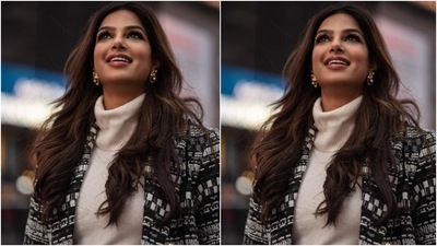 Harnaaz chose a monochrome patterned ensemble for the photoshoot in Times Square. Her cosy and chic outfit is a great pick for making heads turn during the winter season without giving up on comfort. (Instagram/@missuniverse) Harnaaz chose a monochrome patterned ensemble for the photoshoot in Times Square. Her cosy and chic outfit is a great pick for making heads turn during the winter season without giving up on comfort. (Instagram/@missuniverse)