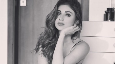 Mouni Roy's glam look in all-black crop top and pants is perfect for lounging at home in style: Photos inside Mouni Roy's glam look in all-black crop top and pants is perfect for lounging at home in style: Photos inside