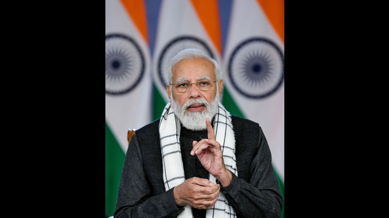 Prime Minister Narendra Modi interacts with the DMs of various districts on the implementation of key government schemes, through video conferencing, in New Delhi, Saturday, January 22, 2022. (PTI) Prime Minister Narendra Modi interacts with the DMs of various districts on the implementation of key government schemes, through video conferencing, in New Delhi, Saturday, January 22, 2022. (PTI)