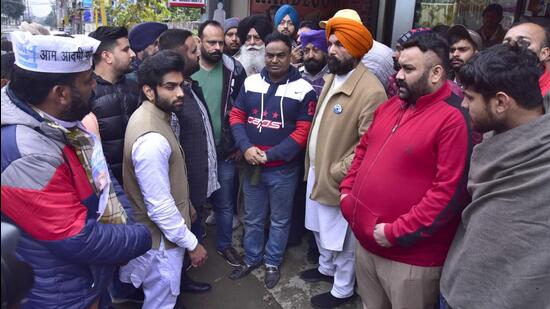 AAP Atam Nagar candidate Kulwant Sidhu accused MLA Bains's son Ajaypreet Singh and his supporters of thrashing AAP ward in-charge over installation of hoardings on a building on ATI road in Ludhiana on Saturday. (Gurpreet Singh/HT)