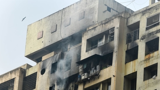 Most of the 400 residents in the building were able to rush out soon after the fire broke out, even as thick smoke filled the passageways.(PTI)