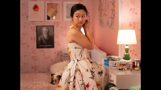 Lilly wears a vintage Oscar da le Renta’s floral dress