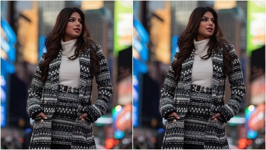 Harnaaz's ensemble features a taupe coloured turtleneck sweater with an exaggerated neckline and a bodycon fit. She teamed the woollen top with a black and white knit mini skirt. The knitted details came in an Aztec print, and the beauty queen cinched it on the waist with a matching fabric belt.(Instagram/@missuniverse)