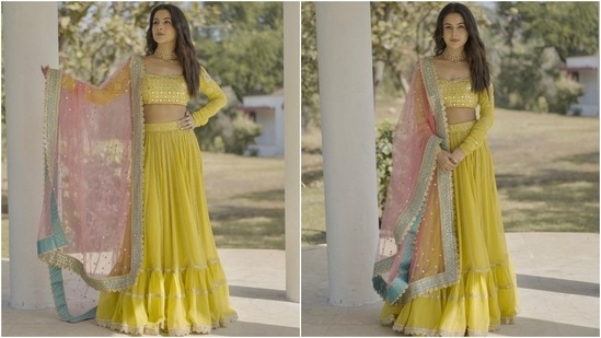 Shehnaaz's lehenga set comes in an eye-pleasing yellow shade.&nbsp;