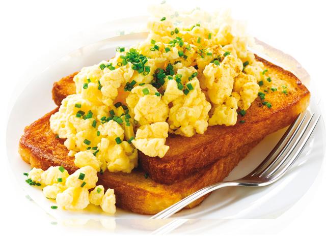 Scrambled eggs can work on toast even when they are dry but runny eggs work best