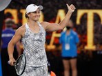 Ash Barty of Australia celebrates after defeating Amanda Anisimova of the U.S. during their fourth round match at the Australian Open tennis championships in Melbourne, Australia, Sunday, Jan. 23, 2022.(AP)