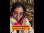 A screengrab from the video in which Dolly Singh puts up a skit where she's a student at Hogwarts, receiving a call from her mom. (instagram/@dollysingh)