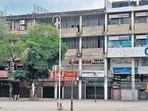 CII asked states to consider curbs at micro containment zones only when hospitalisation rates are over 75%. In picture - Shops remain closed during a weekend curfew.(HT File Photo) CII asked states to consider curbs at micro containment zones only when hospitalisation rates are over 75%. In picture - Shops remain closed during a weekend curfew.(HT File Photo)