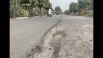 HALF-BAKED PLANS: One side of the Cremation Ground Road in Model Town Extension is covered with premix while the other half continues to have potholes, with a height difference of at least two to three inches between both sides. (Gurpreet Singh/HT) HALF-BAKED PLANS: One side of the Cremation Ground Road in Model Town Extension is covered with premix while the other half continues to have potholes, with a height difference of at least two to three inches between both sides. (Gurpreet Singh/HT)