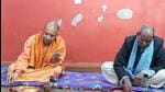 Uttar Pradesh chief minister Yogi Adityanath have lunch at the residence of Amritlal Bharti, in Gorakhpur, on January 15, 2021.(ANI photo)