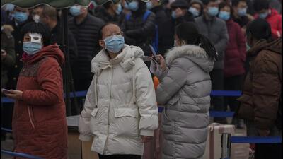 People line up for a Covid-19 test at a hospital in Beijing, China, on Sunday. The capital has reported 39 Covid-19 infections since January 15, a mix of Delta and Omicron variants, with the highest number diagnosed in the Fengtai district. (AP) People line up for a Covid-19 test at a hospital in Beijing, China, on Sunday. The capital has reported 39 Covid-19 infections since January 15, a mix of Delta and Omicron variants, with the highest number diagnosed in the Fengtai district. (AP)