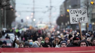 Anti-vaccine protesters take part in a march. (Representative image/AFP) Anti-vaccine protesters take part in a march. (Representative image/AFP)
