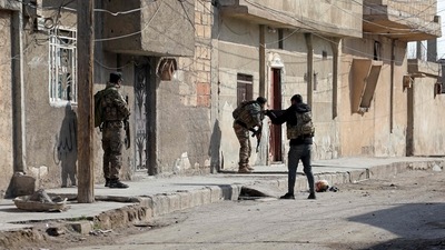 Ongoing battles have seen IS fighters free fellow jihadists and seize weapons stored at the jail, according to the Britain-based Syrian Observatory for Human Rights, in what experts have described as a blatant regrouping attempt. In picture - Kurdish security forces deploy in Syria's northern city of Hasakeh. (AFP) Ongoing battles have seen IS fighters free fellow jihadists and seize weapons stored at the jail, according to the Britain-based Syrian Observatory for Human Rights, in what experts have described as a blatant regrouping attempt. In picture - Kurdish security forces deploy in Syria's northern city of Hasakeh. (AFP)